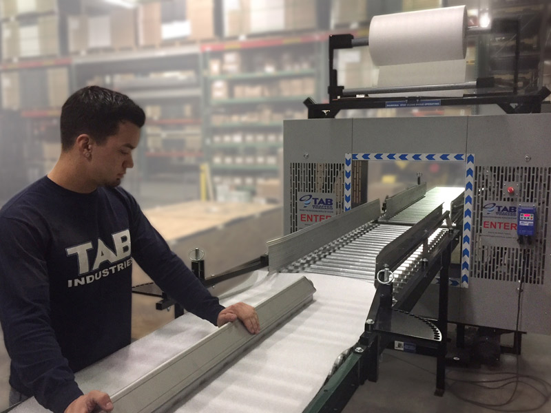 TAB Industries Dual Dispensing Orbital Wrapper Secures Pallet