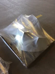 Wrapped formed metal components